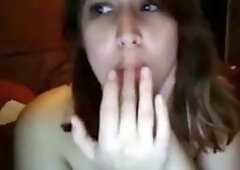 This video features a curvy amateur with natural assets. Her big, saggy breasts and meaty pussy lips are the stars as she strokes her intimate folds, 