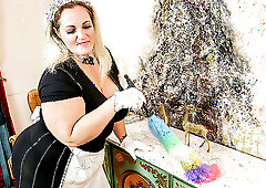 Heavy housemaid playing with something she found