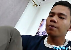 Asian twink takes his socks off and teases before cumming