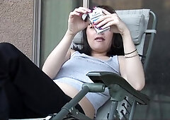 Having a smoke on the balcony and looking hot