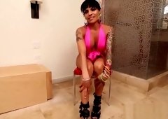 Tanlined shemale toying her ass with dildo