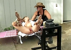 Young Hottie Tied Outdoors With Machine Dildo