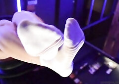 Hot Female-Dominant feet in white nylon socks is teasing u. All u need to do is obey and work hard with your tongue.