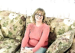 Older Stepmom with large melons takes off her raiment and fingers her large snatch