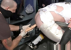 Tall redheaded football player bound gagged striiped and