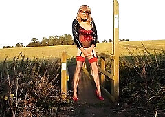 Shemale Gina Trent outdoors and squirting greater amount milk from her booty, with some pissing likewise