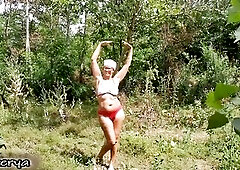 Outdoors, Lukerya decided to feel like a hot nurse, taking off her robe and brassiere.