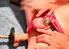 A precious slow screw in my fresh pants and flat cage, with cum dribbling from my caged clitty