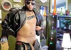 Kennie Jai in leather gives himself a good milking for you