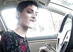 Short haired brunette beauty strokes her tranny dick in heels