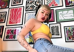 Blonde teen in solo action with her pussy