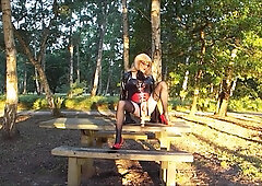 T-Girl In vinyl Gets Plowed By Machine On Picnic Table