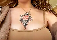 Flirty Tattooed Girl Shows Off Big Tits in Public
