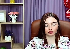 Redhead babe flashes big natural tits