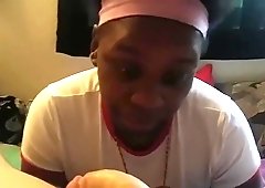 Ebony slave worships cock and balls after a dab