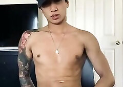 Thai Miiaca jerks his cock