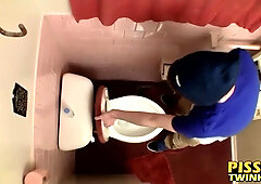 Devin Reynolds grabs his prick & unloads in the toilet