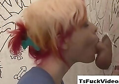 slut licks trannys penis thru gloryhole