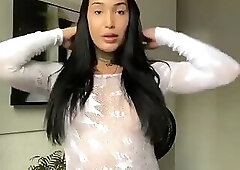 Sexy latina Trans loves stripping away her see through dress for her fans