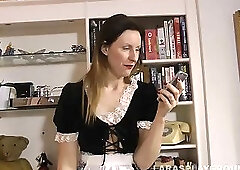 Sexy maid toys her cunt