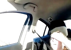 Car Sex With a Busty MILF Caught on Webcam