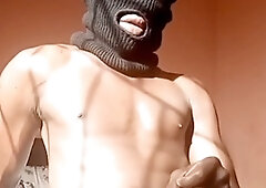 Horny gay stud enjoys stroking his massive throbbing sausage