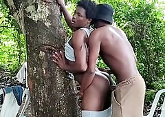 Bang black Lagos queen underneath a mango tree doggy