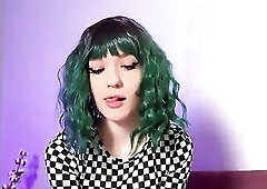 Green haired alternative cutie gives footjob in checkered top
