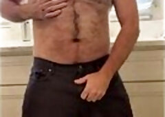 Hairy man strips, plays with toys and blows a huge load