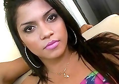 Cute brunette tranny with small tits rides a big dick