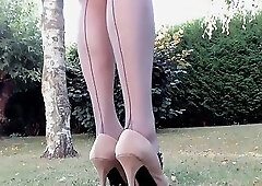 seamed nylon-clad legs and nothing else