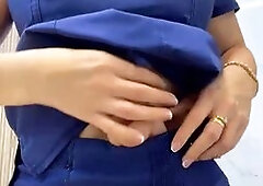 Busty Nurse Strips in Medical Office