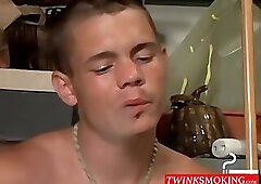 Handsome guy with necklace blow his smoke and spills his cum