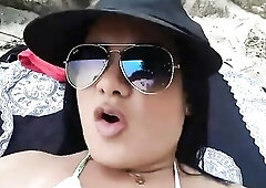 Exhibitionist shows anything on the beach with her boyfriend.