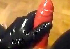 Naughty shemale in latex outfit jerks off and cums loads