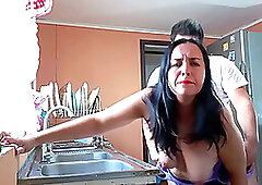 Fucking my stepmom in the kitchen topless and moaning loudly