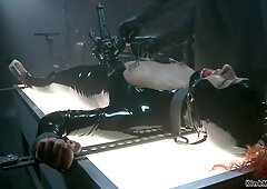 Shackled ebony in latex beaver vibed