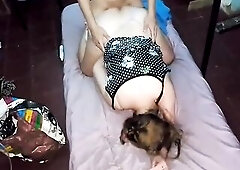 Medi in Her Floral Costume and Purple Strap