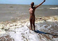 Swimming, spraying and posing bare in the river...