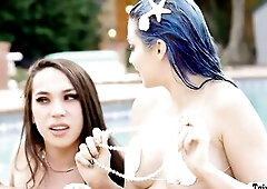 Breasty TS Kasey Kei and Jewelz Blu are the one and the other wearing a mermaid custome on the pool.After that,they begin giving a kiss every other an