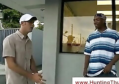 White gay boy eats chocolate at a shop