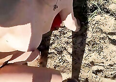 Charming angel gives cum in her butt on the beach