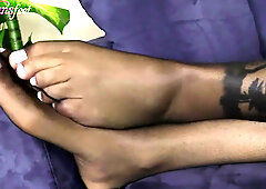 Blonde tbabe shows her feet in black nylons