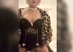 Crossdresser masturbating in daybed with anal sex-toy inside