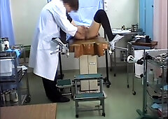 Hardcore fingering for a cute Jap during the pussy exam