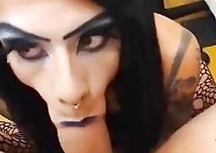 Dazzling shemale gags on that dick like it's her last