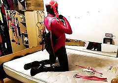 some other self servitude hogtie with the armbinder.. in me PVC catsuit and lycra body costume over top.. gagged and my old cum moist pants for admira