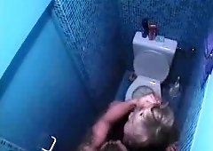 Slutty blonde takes her man to the restroom to suck him off