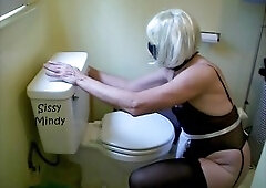 Authentic sissy maid provides thorough cleaning service