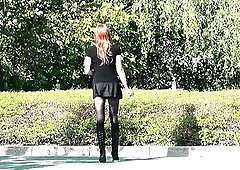 Ladyboy wears mini-petticoat and boots / Transgender